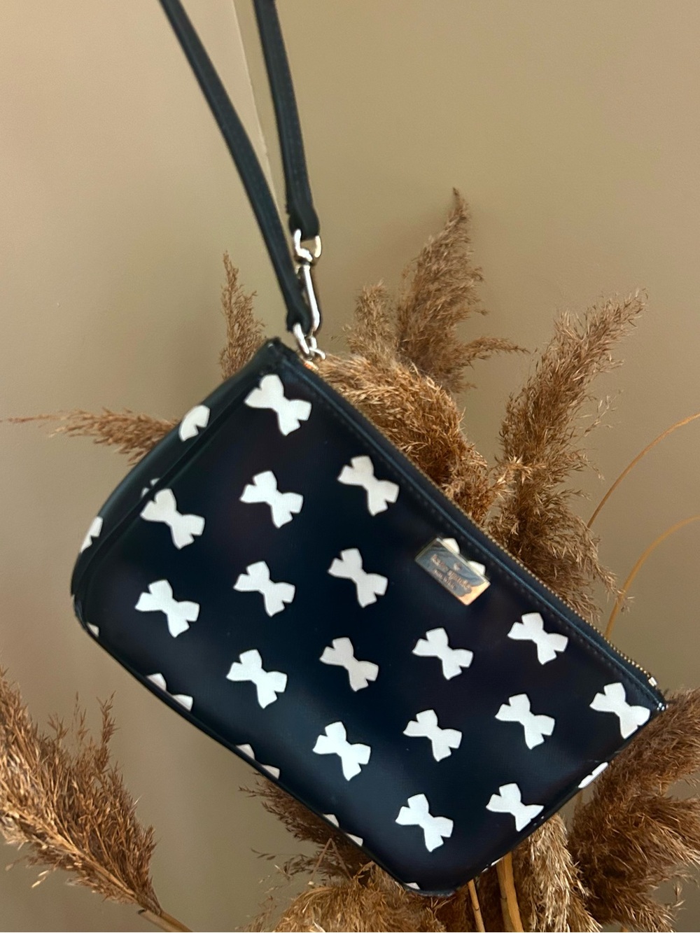 kate spade Black Wristlet Clutch with White Bow Print